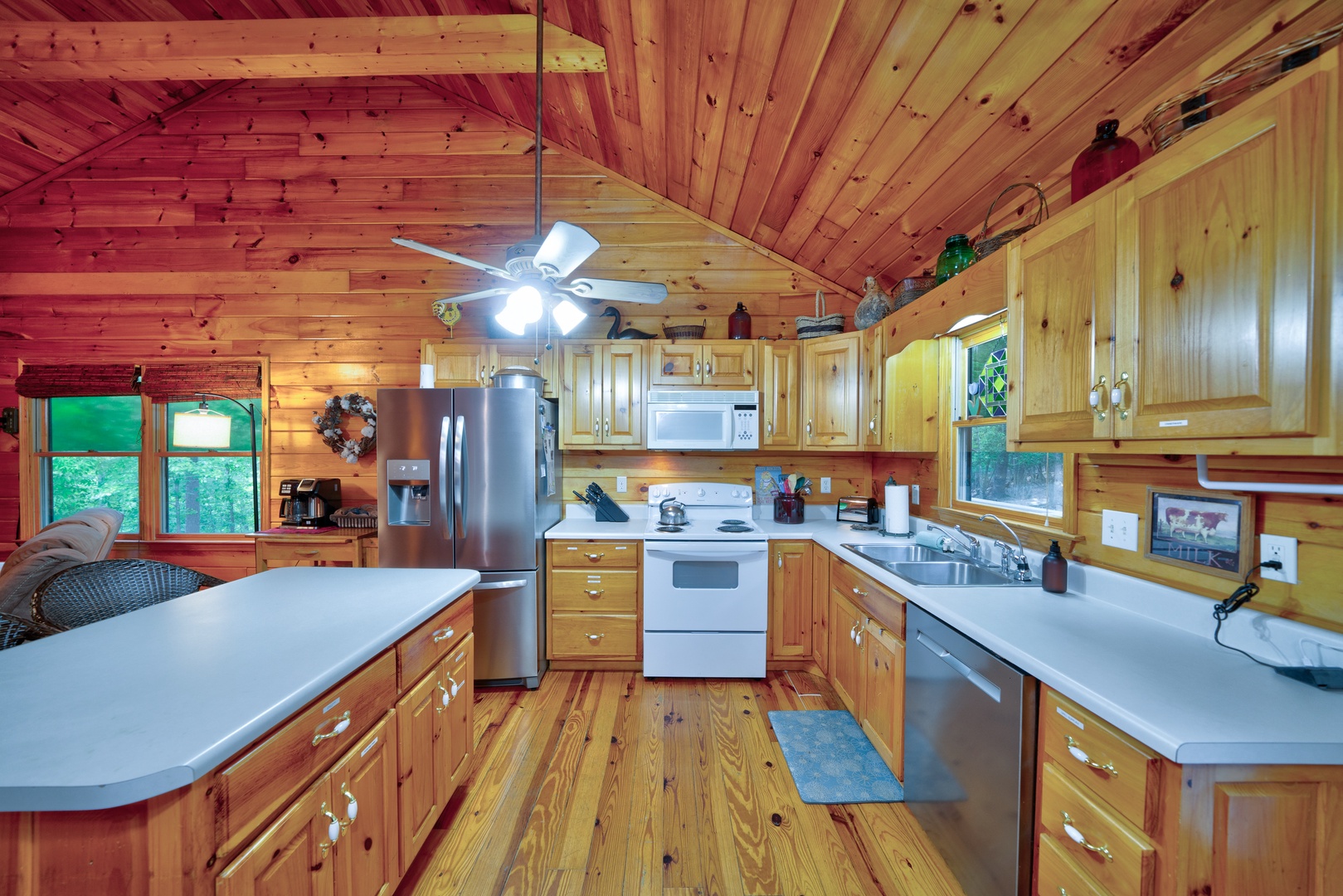 The inviting open kitchen offers ample space & all the comforts of home