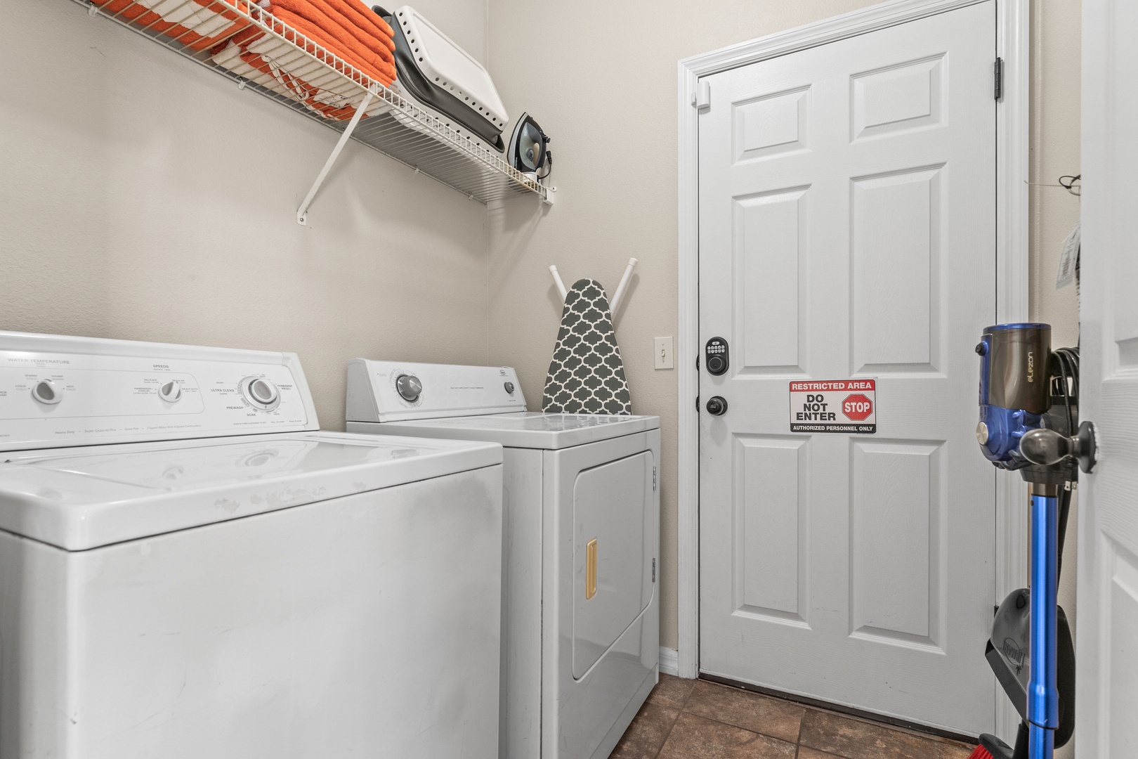 Private laundry available for your stay located off kitchen