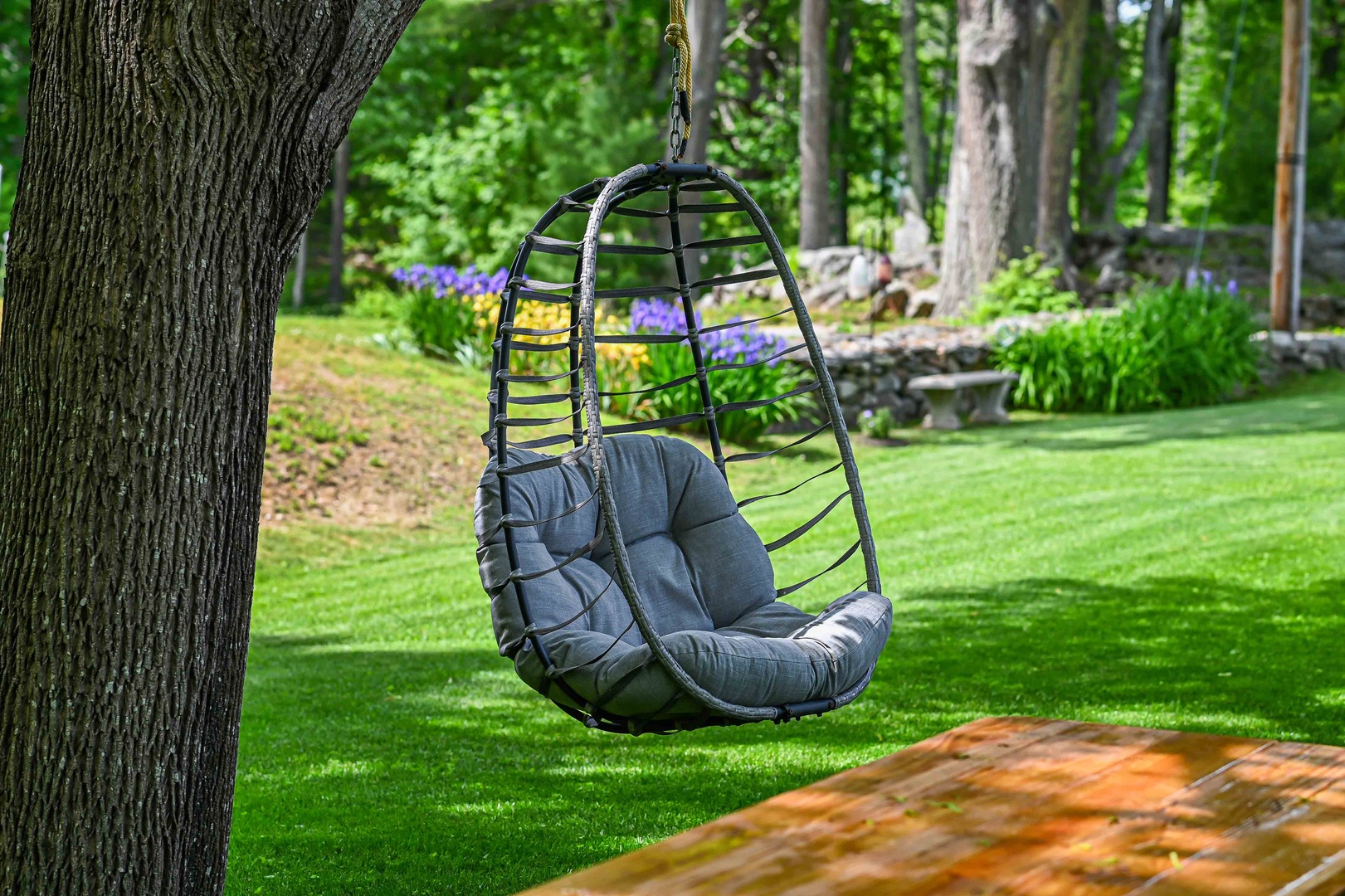 Enjoy a good read outside in this comfortable chair!