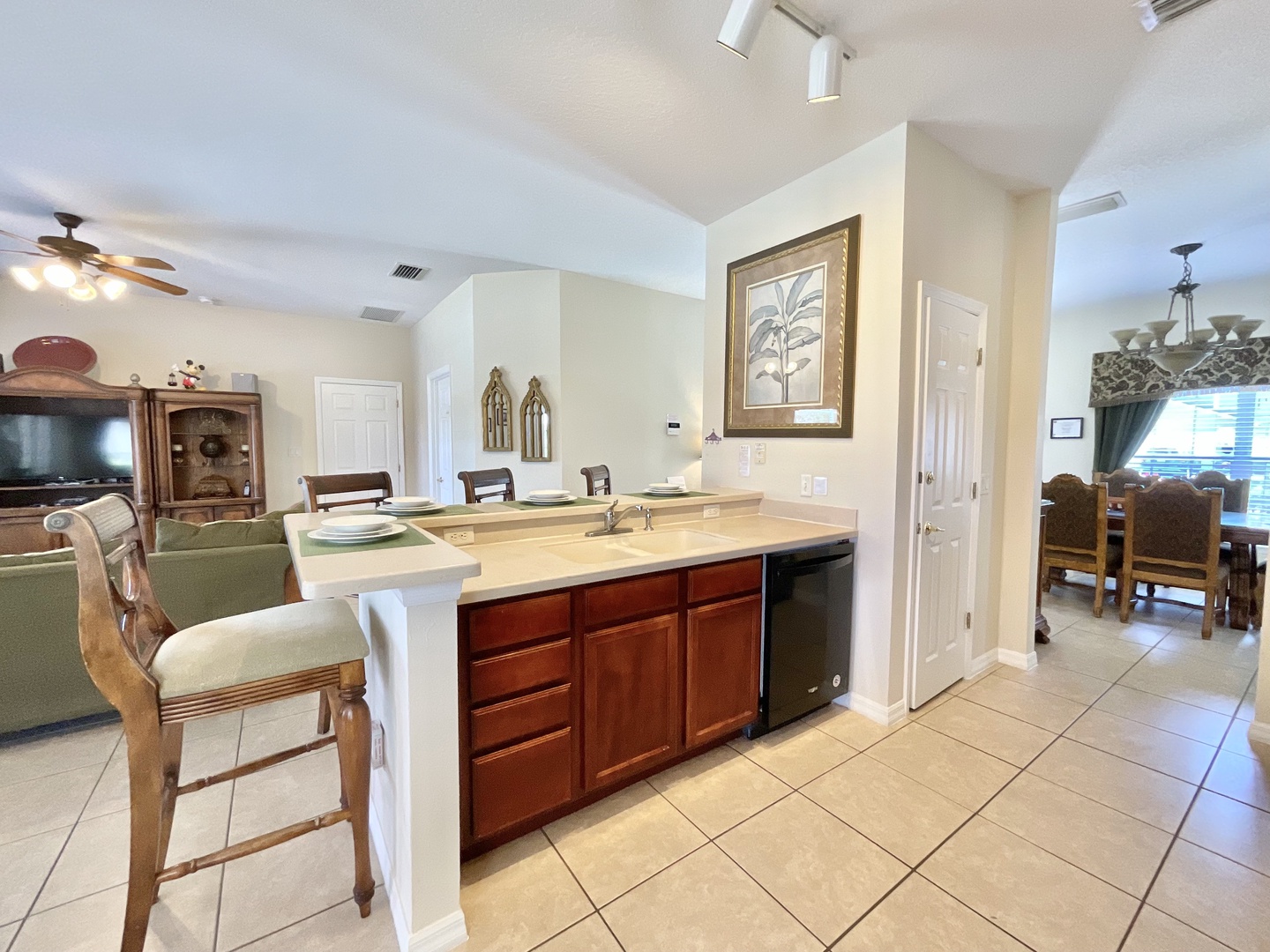 The kitchen offers ample storage space & all the comforts of home