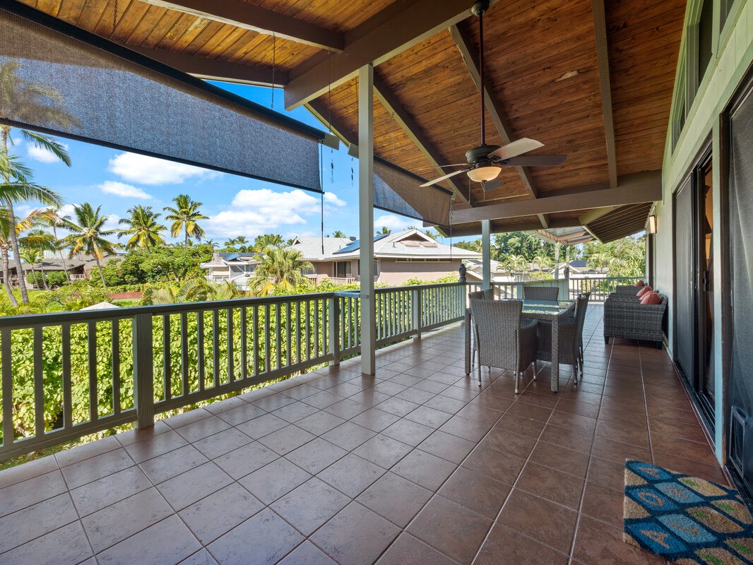 Large covered lanai with outdoor seating