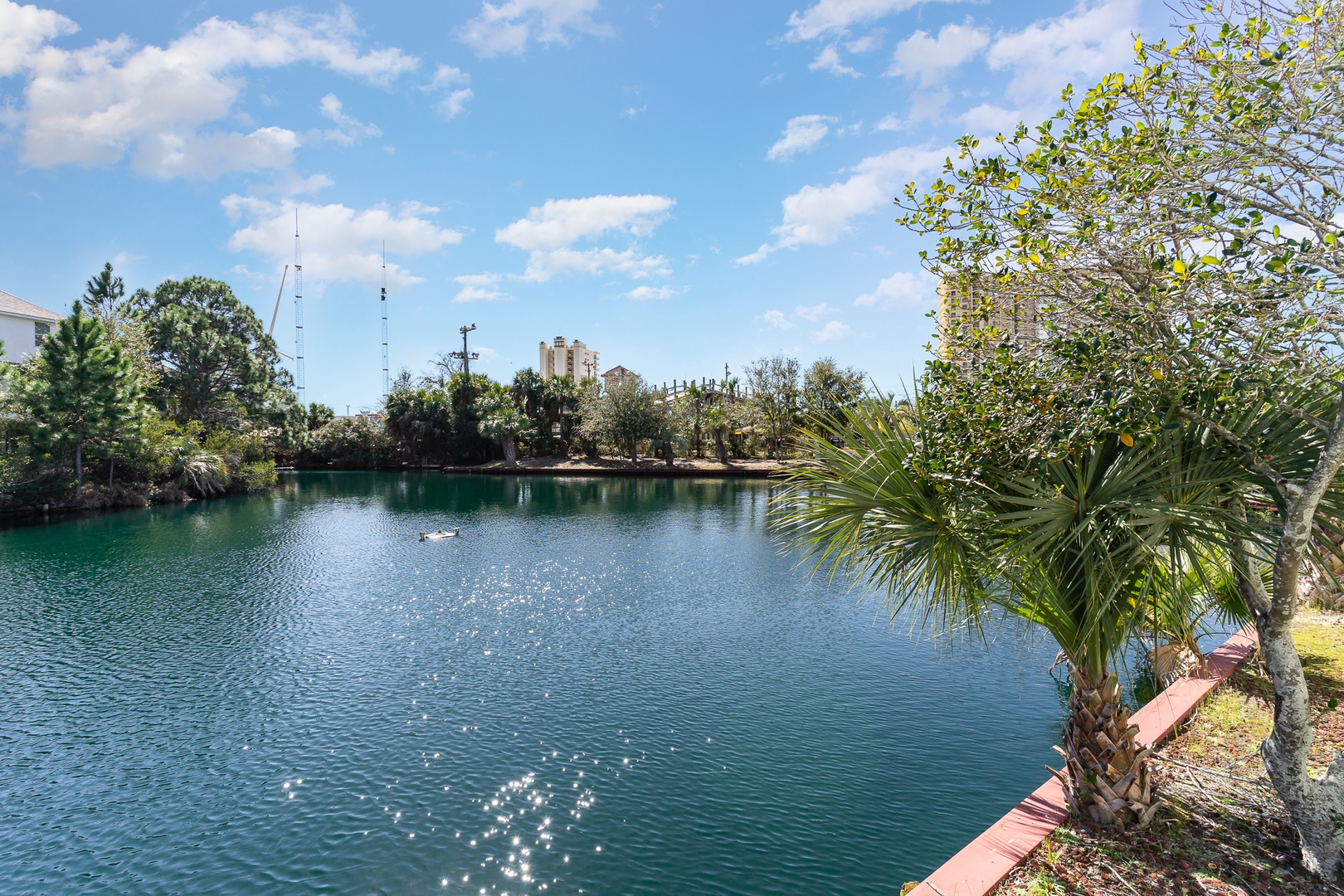 Lounge the day away with serene water views on the screened patio