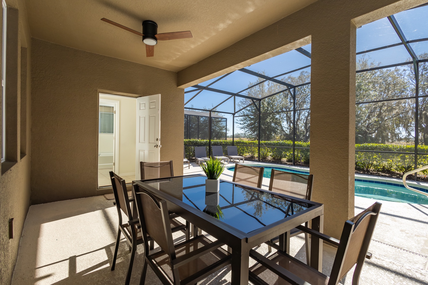 Dine alfresco or enjoy a cocktail on the screened patio