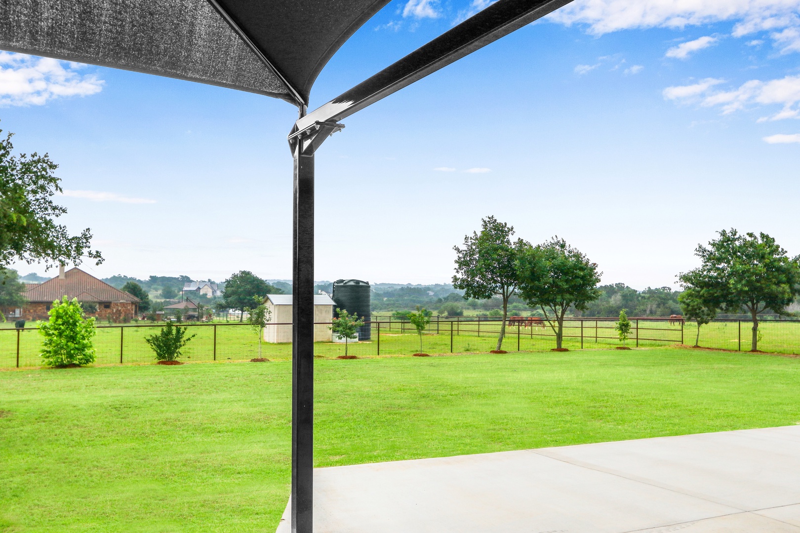 Step out onto the shaded patio & relax in the fresh air with gorgeous views