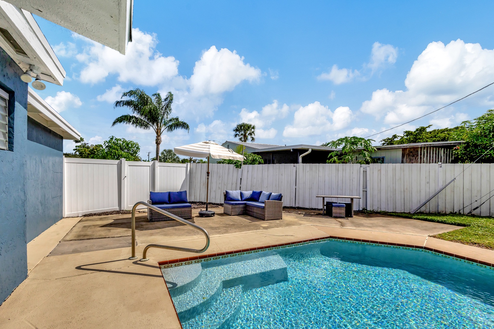 Back yard with private pool and outdoor seating