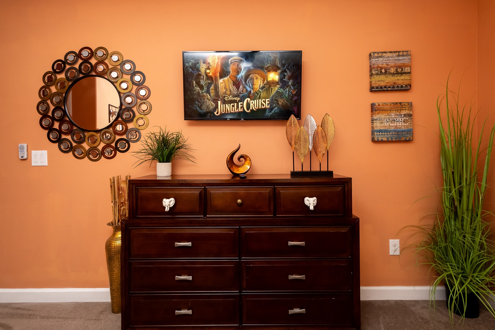 Bedroom 7 Lion King themed with king bed, Smart TV, and shared ensuite