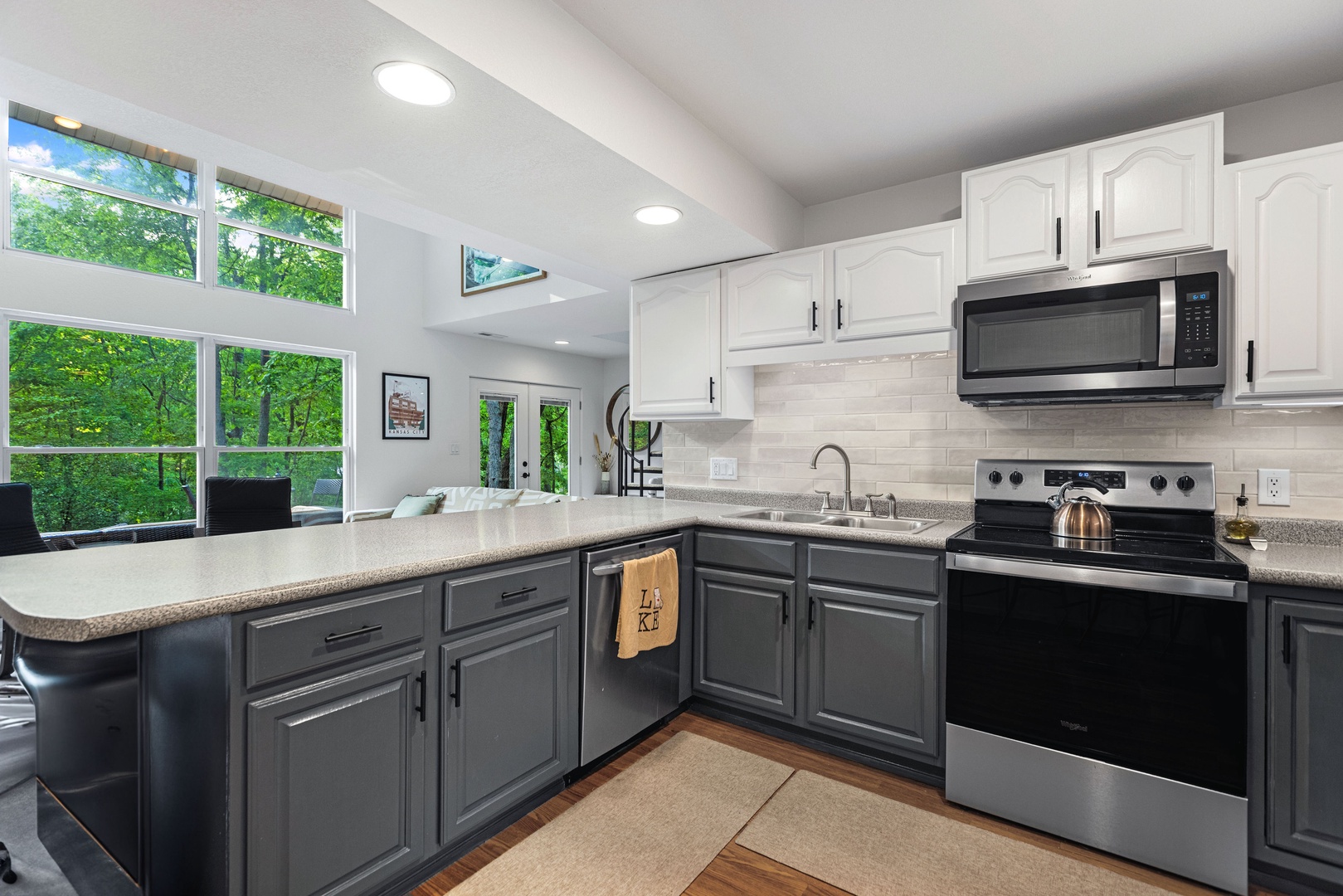 The open, airy kitchen offers ample space & all the comforts of home