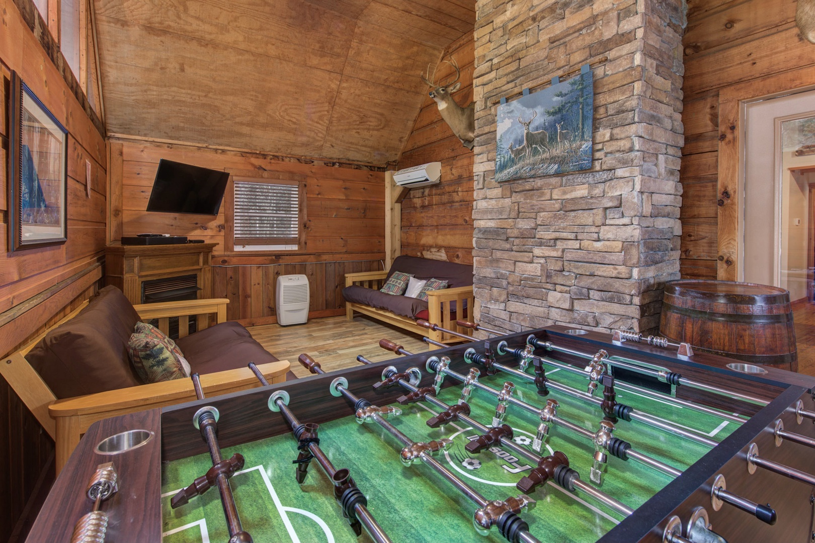 Ignite your competitive spirit with a game of foosball in the game room!