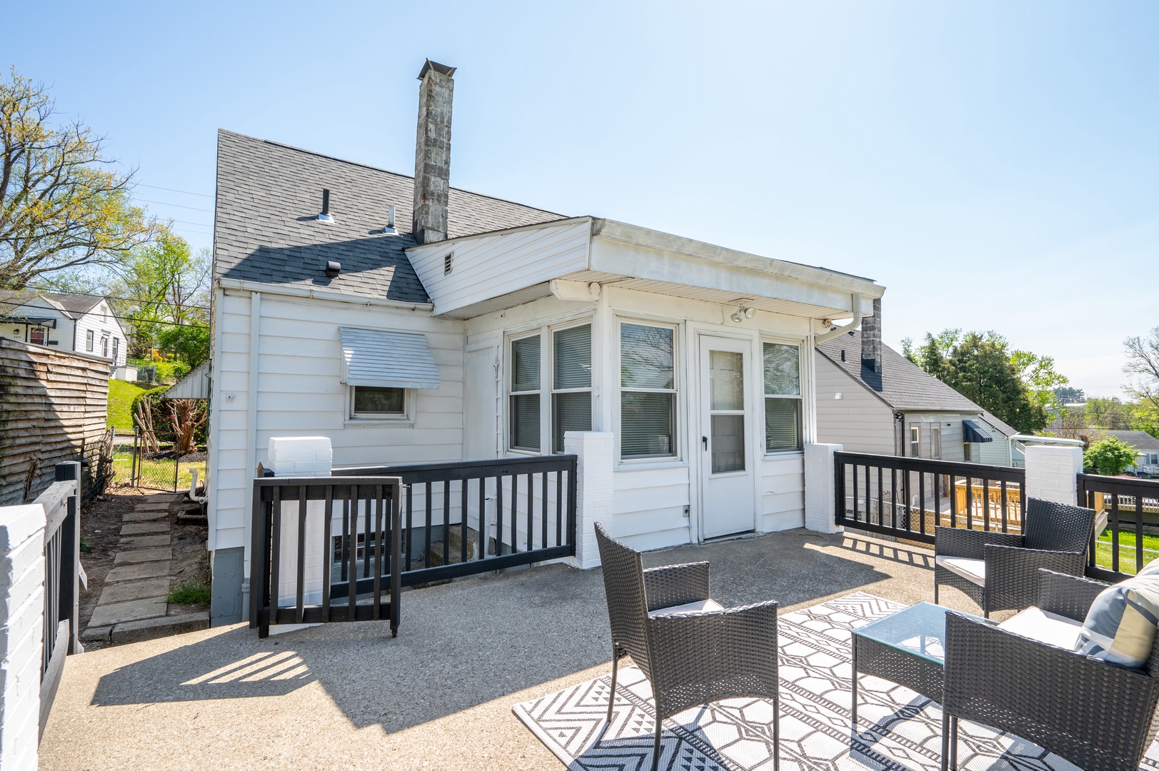 Enjoy the fresh air and sunshine on the Back Deck, with outdoor seating available for 4