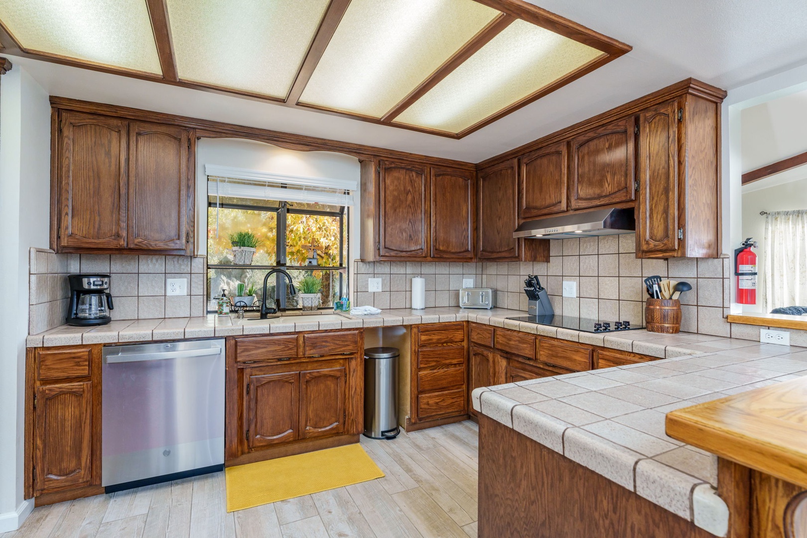 The large kitchen is well equipped and offers ample counter and storage space