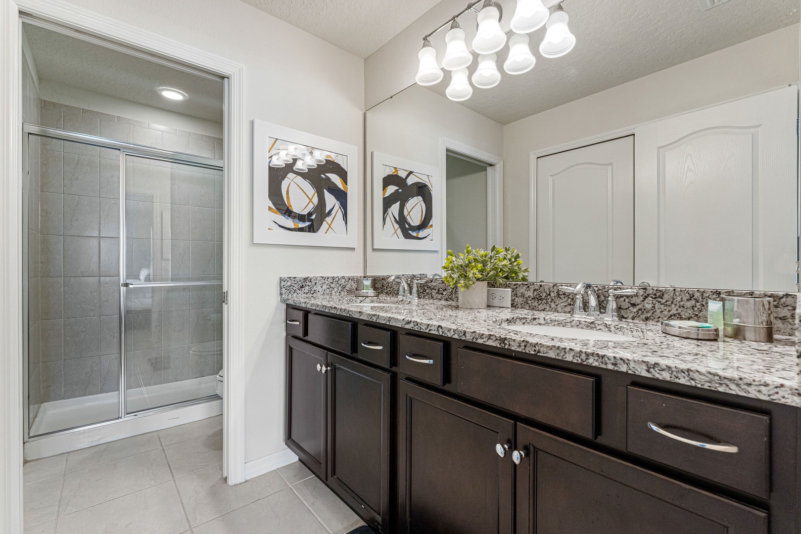 Wash up in this queen ensuite, with a double vanity & walk-in shower