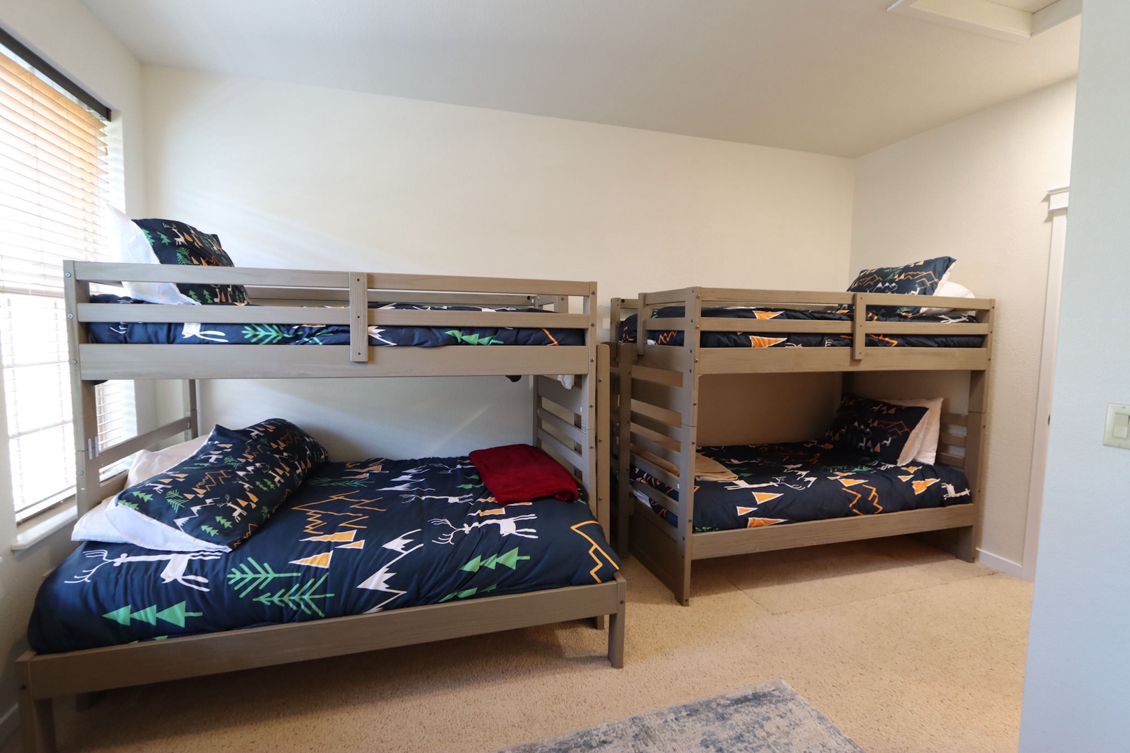 Bedroom #2 with Bunk Beds (3 Twin, 1 Full) and a Futon