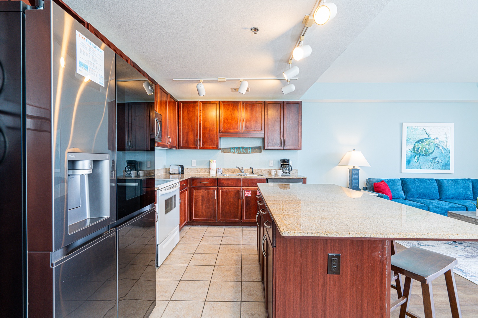 The open, airy kitchen offers ample space & all the comforts of home