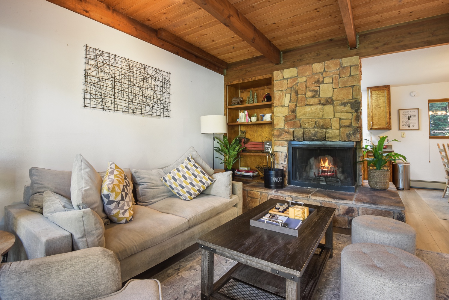 Unit #3: Curl up for a snooze or a movie by the fire in the elegant, plush living room