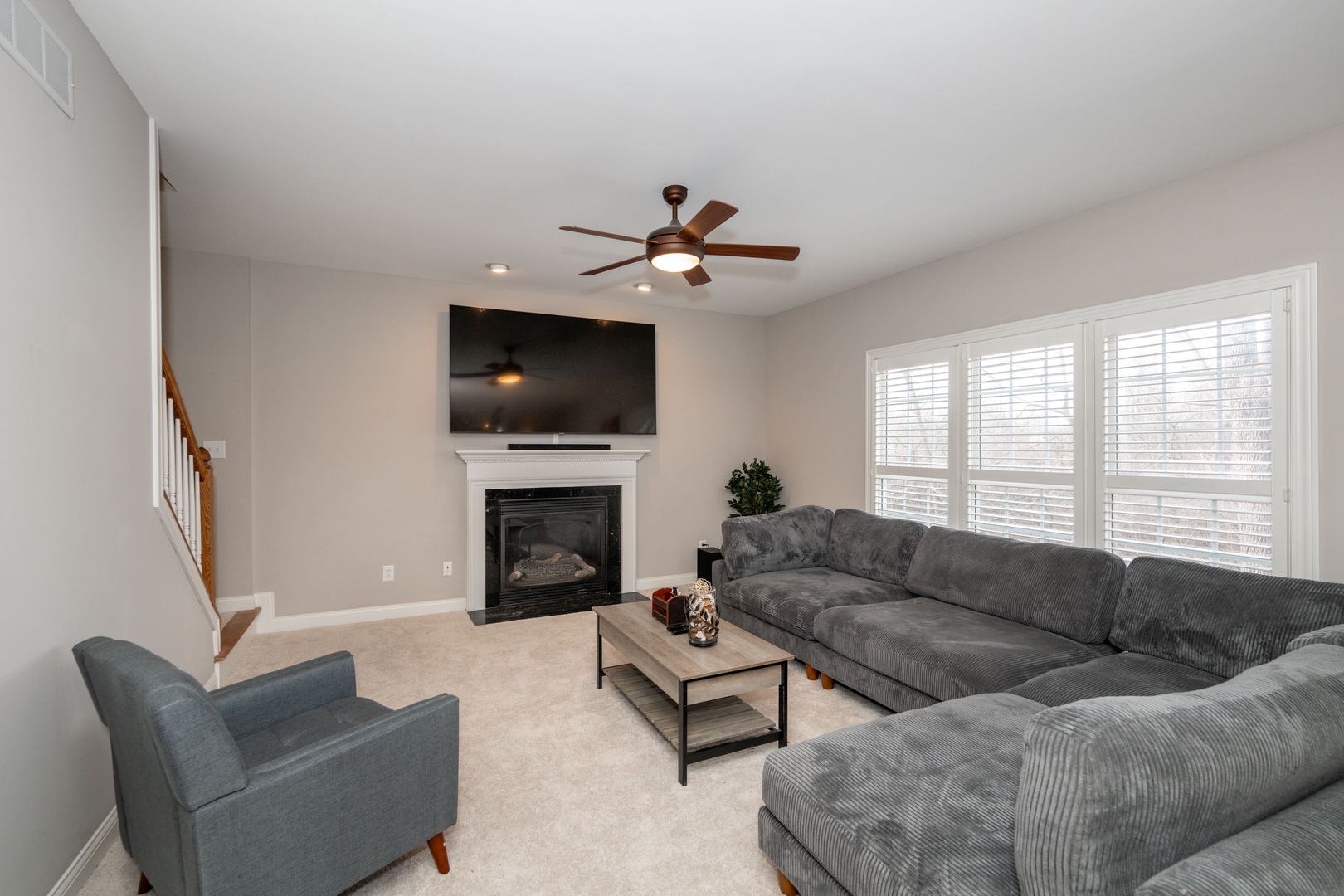 Living space with ample seating and Smart TV