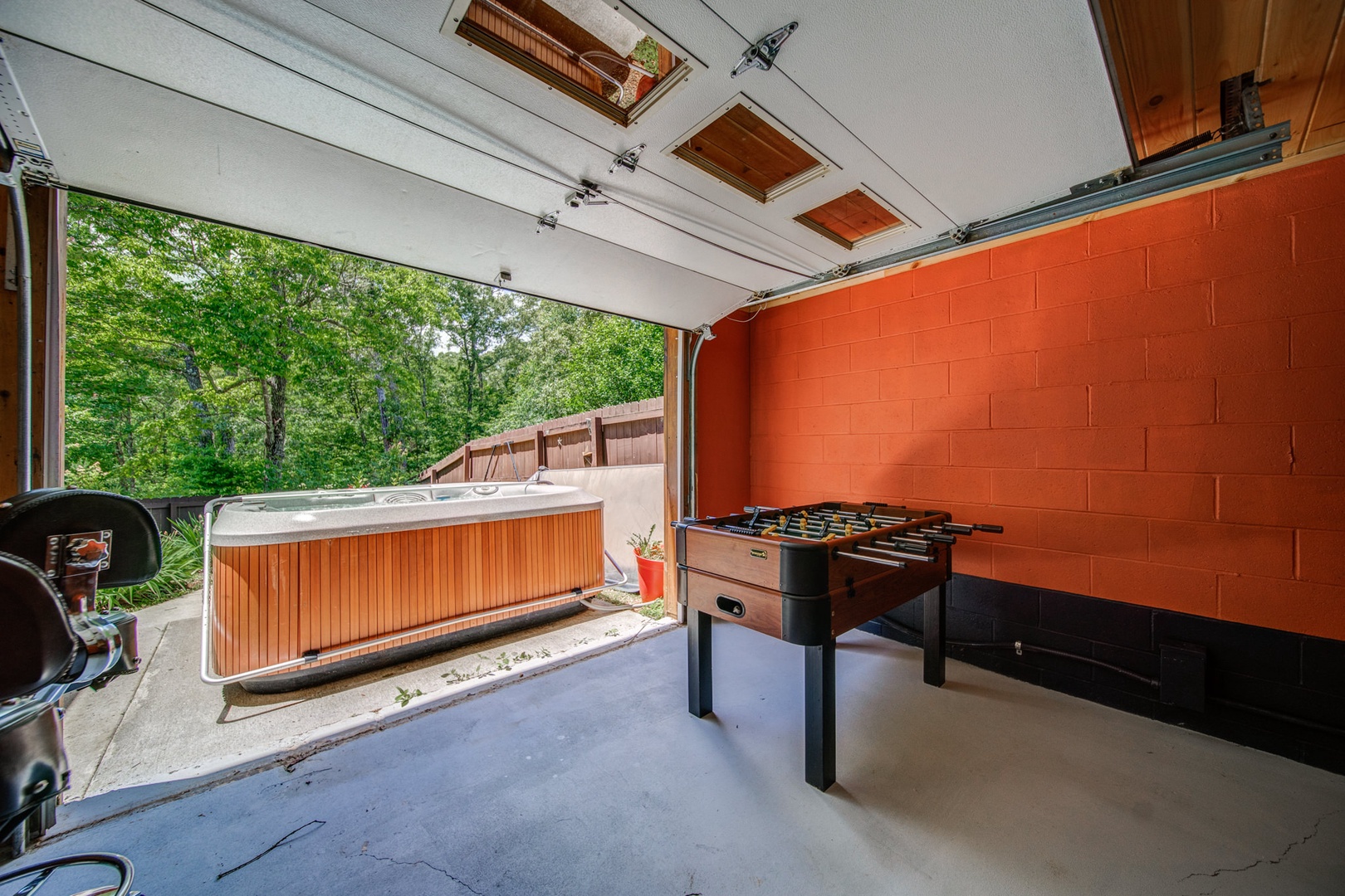 Bar and game room open up to the outdoor space for full on entertainment