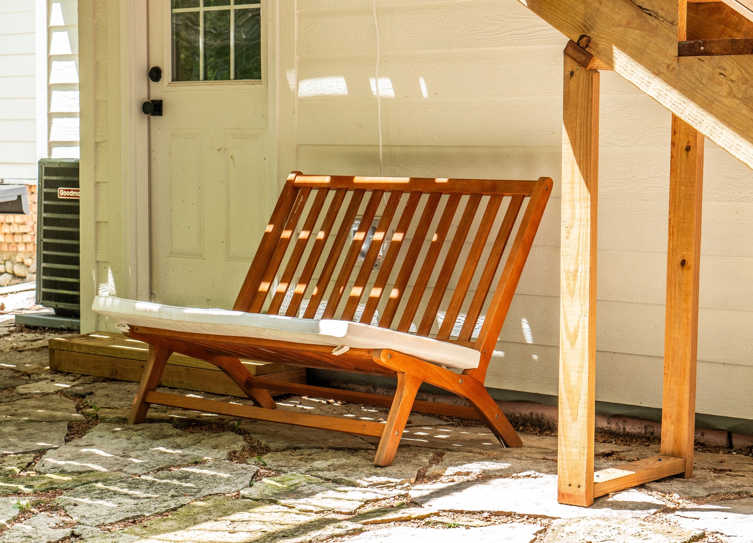 Unwind in the secluded backyard, serenaded by the soothing sounds of the stream