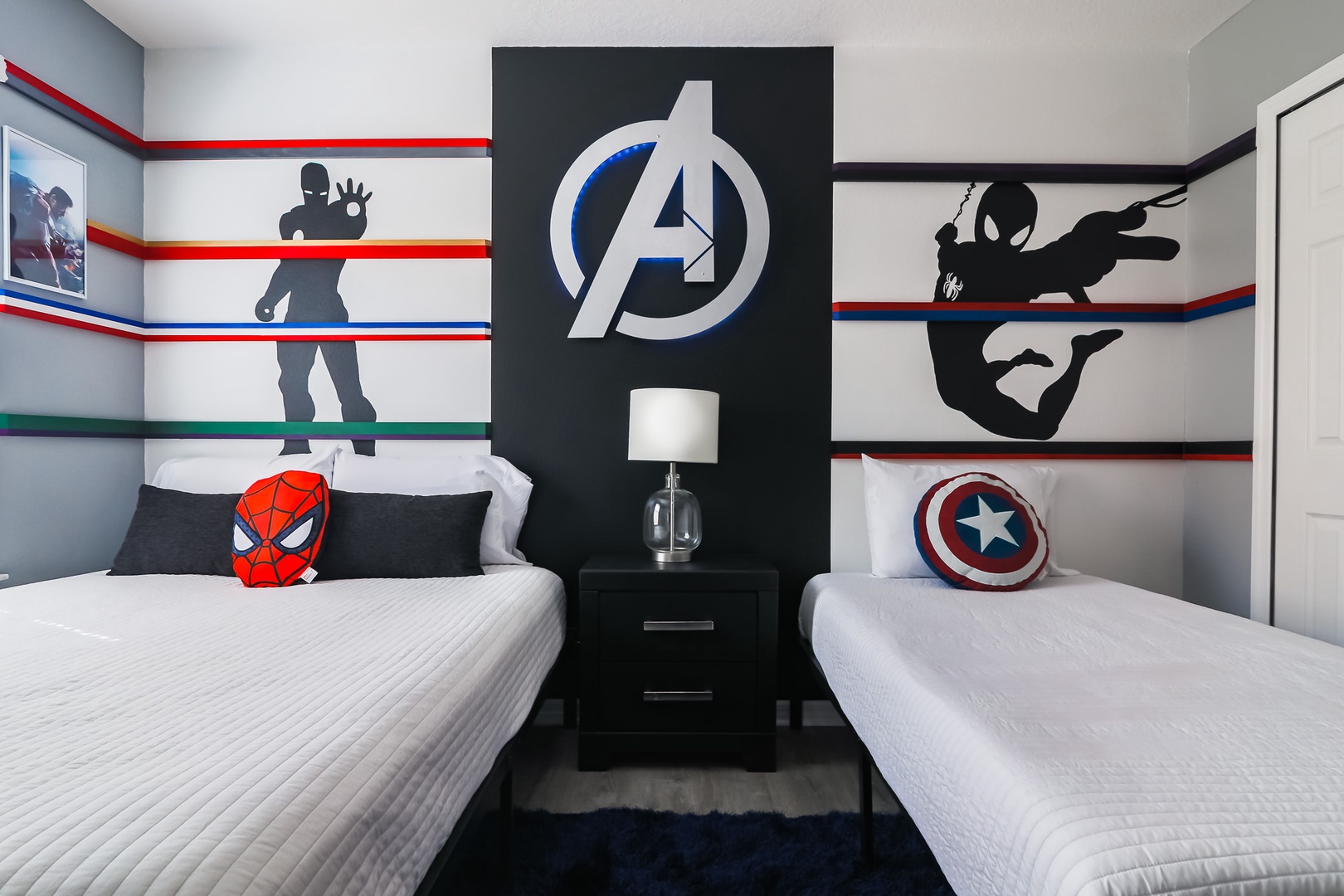 Bedroom 6 Avengers themed with Queen bed, Twin bed, Smart TV, and Jack & Jill style bathroom (2nd floor)