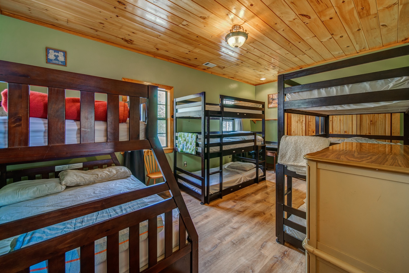 The Bunk Room offers ample sleeping space with 7 Twin Bunks and 1 Full Bunk