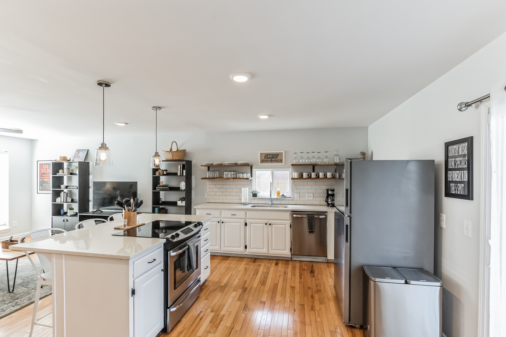 This open kitchen offers ample space & all the comforts of home
