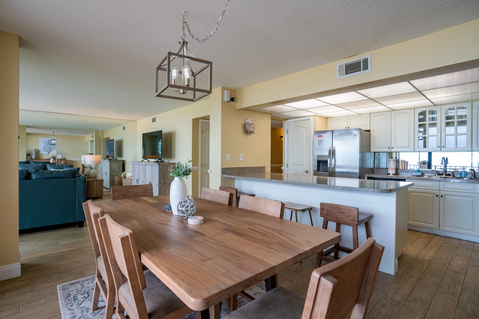 Dining room table with seating for six at the table.