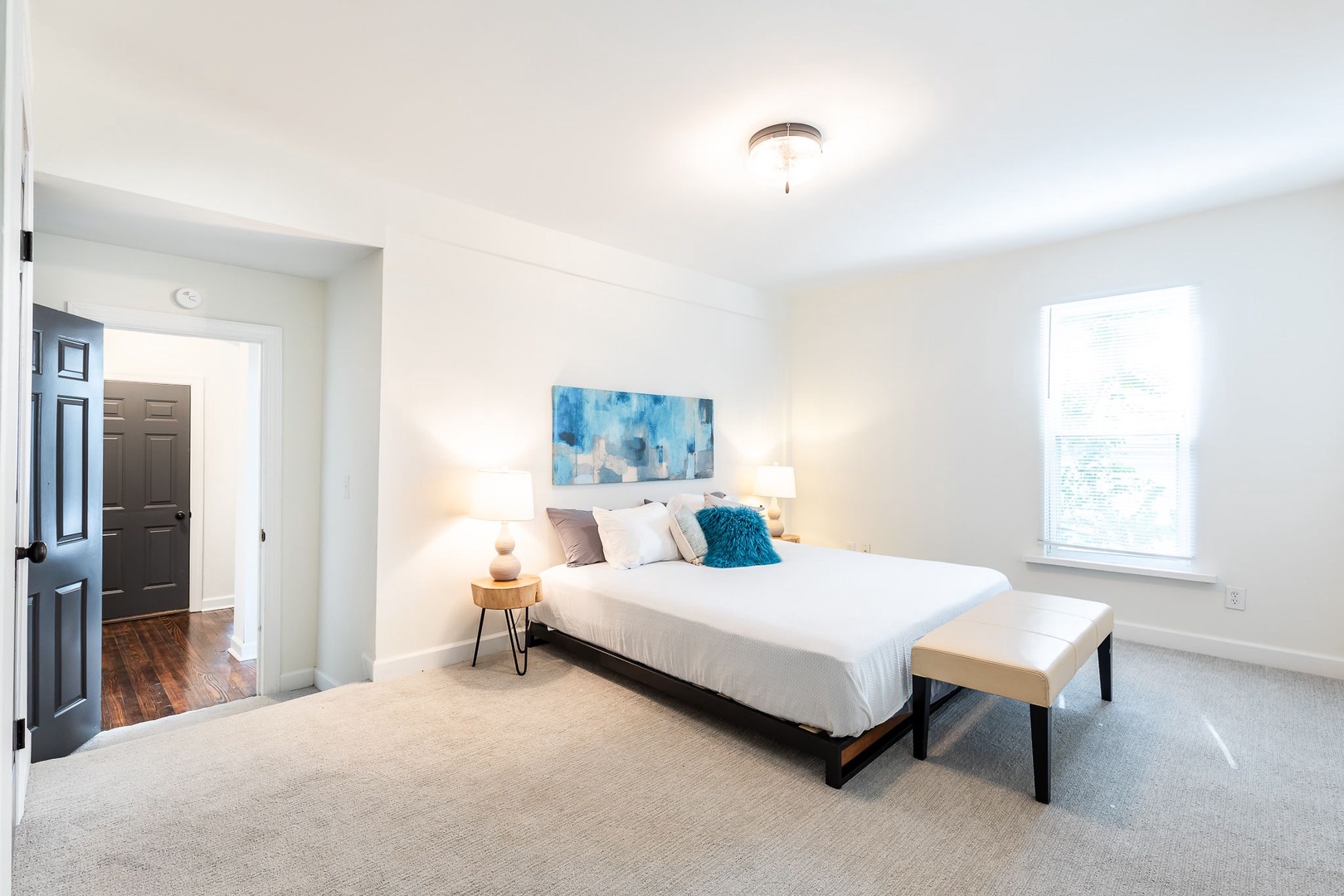 Apt 1 – The tranquil king bedroom is spacious & elegant