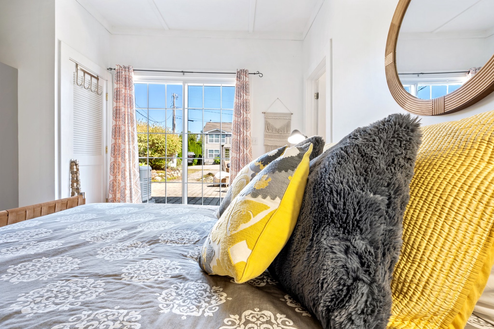 Cozy queen bedroom with seamless access to the patio