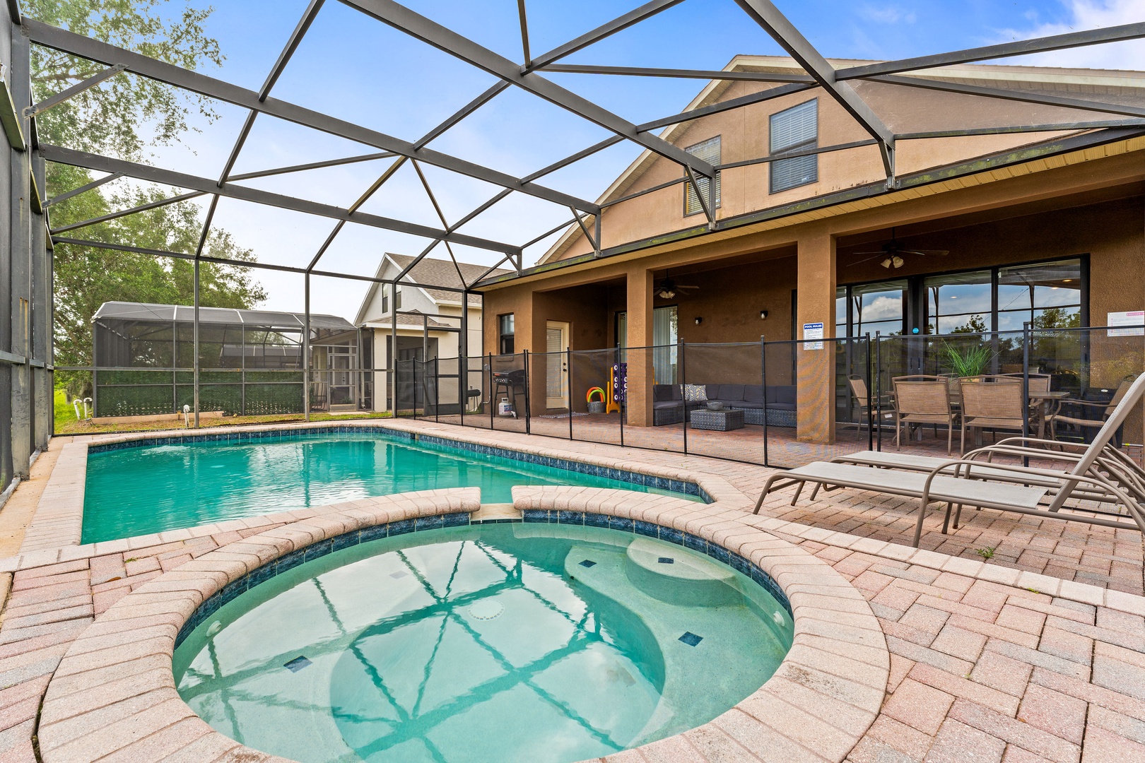 Private screened pool with outdoor seating.  Note: not a hot tub just seating area.