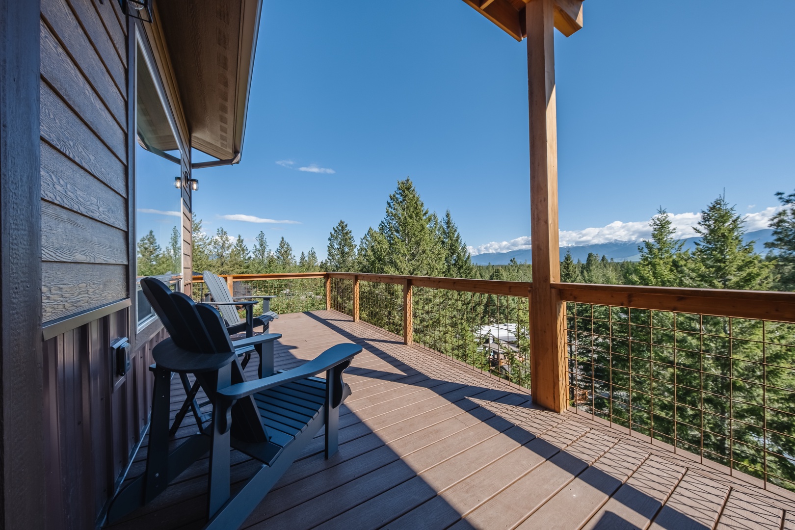 Take a moment to unwind and breathe in the fresh air on the deck