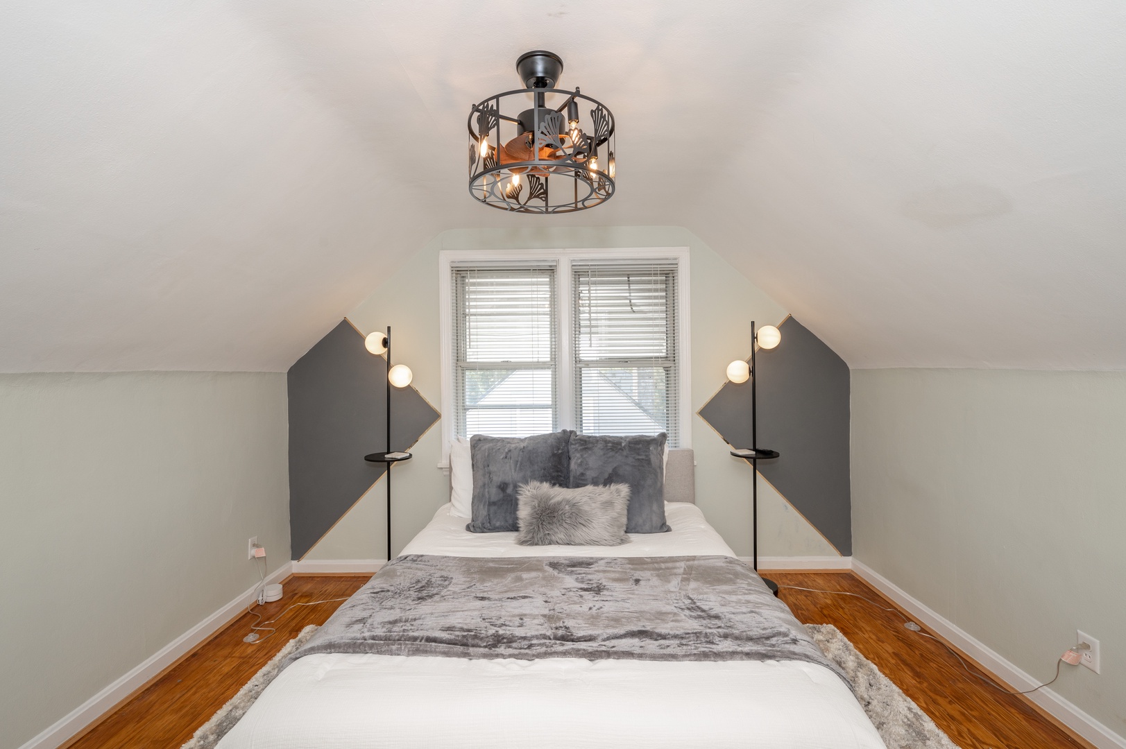Fall into plush bedding in this stylish 2nd Floor Queen Bedroom with Ceiling Fan