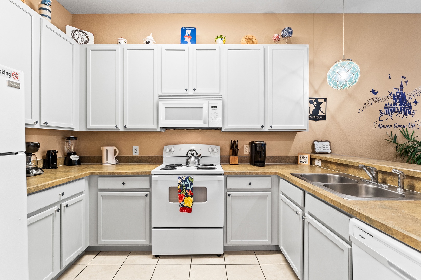 The open, airy kitchen offers ample space & all the comforts of home