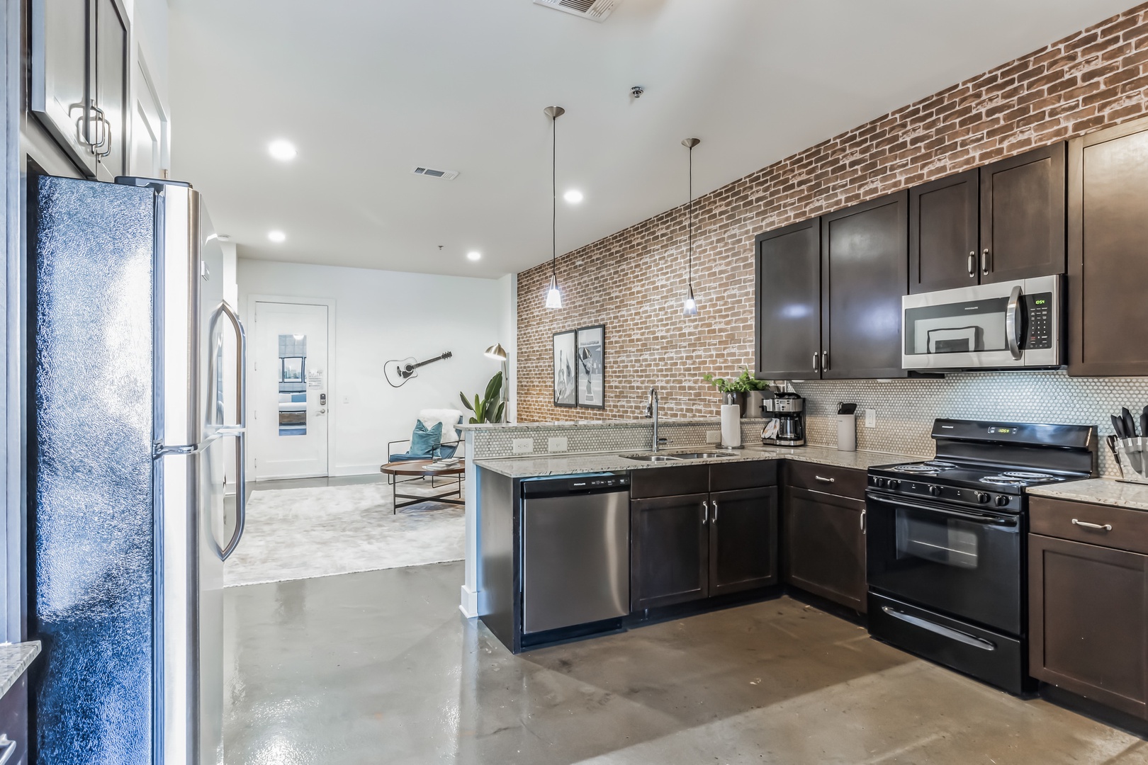 22The contemporary kitchen provides generous space and all the comforts of home