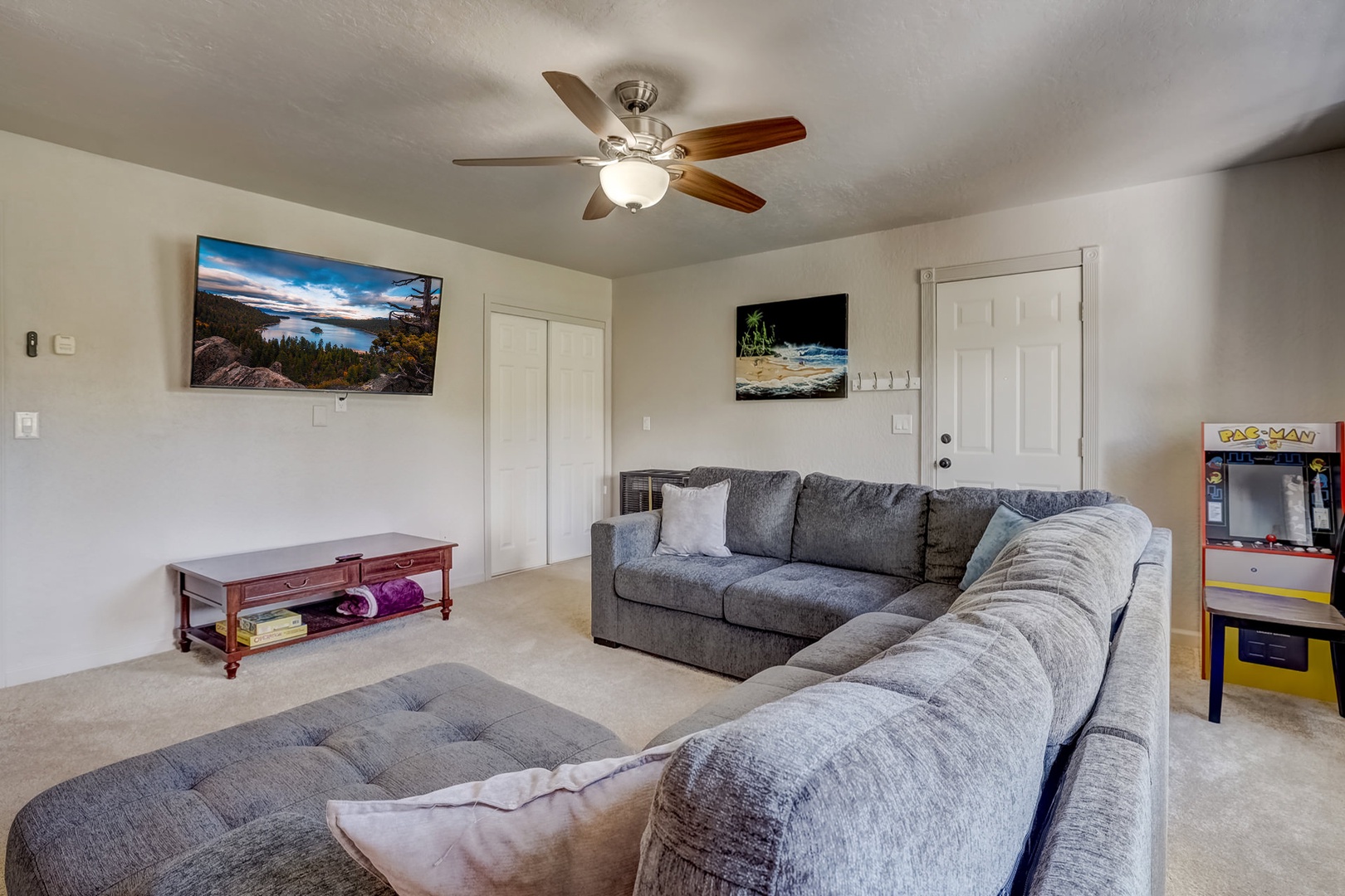 Bedroom 3 with large sectional pull out sofa , Smart TV, Pac-Man game, Jack & Jill style bathroom  (downstairs)