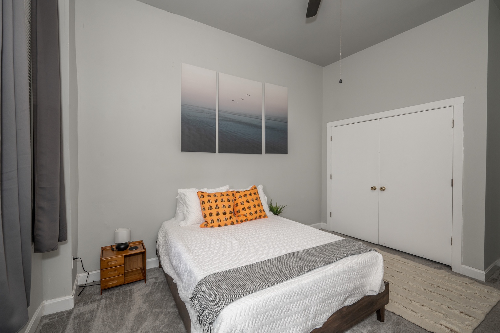 Unit 2: The 1st of 2 queen bedrooms offers a Smart TV & ceiling fan