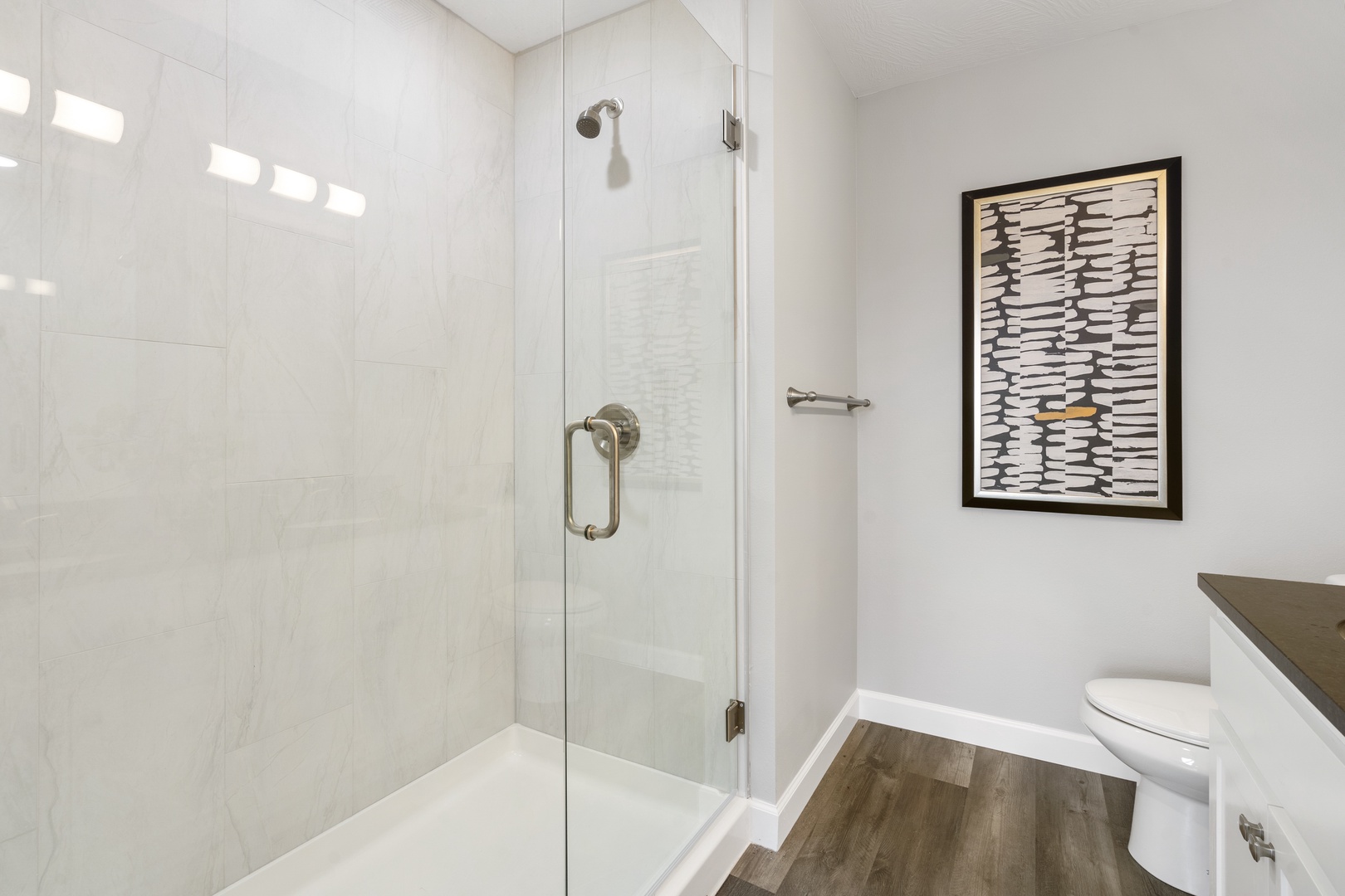 A double vanity & shower await in this large ensuite bath