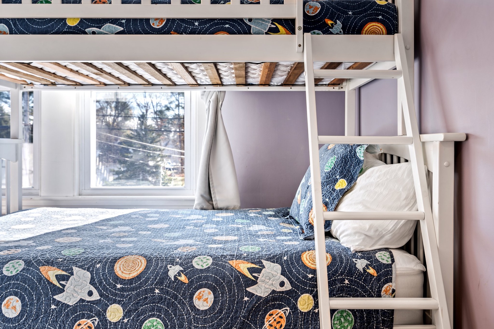 This bedroom retreat offers twin over full bunkbed