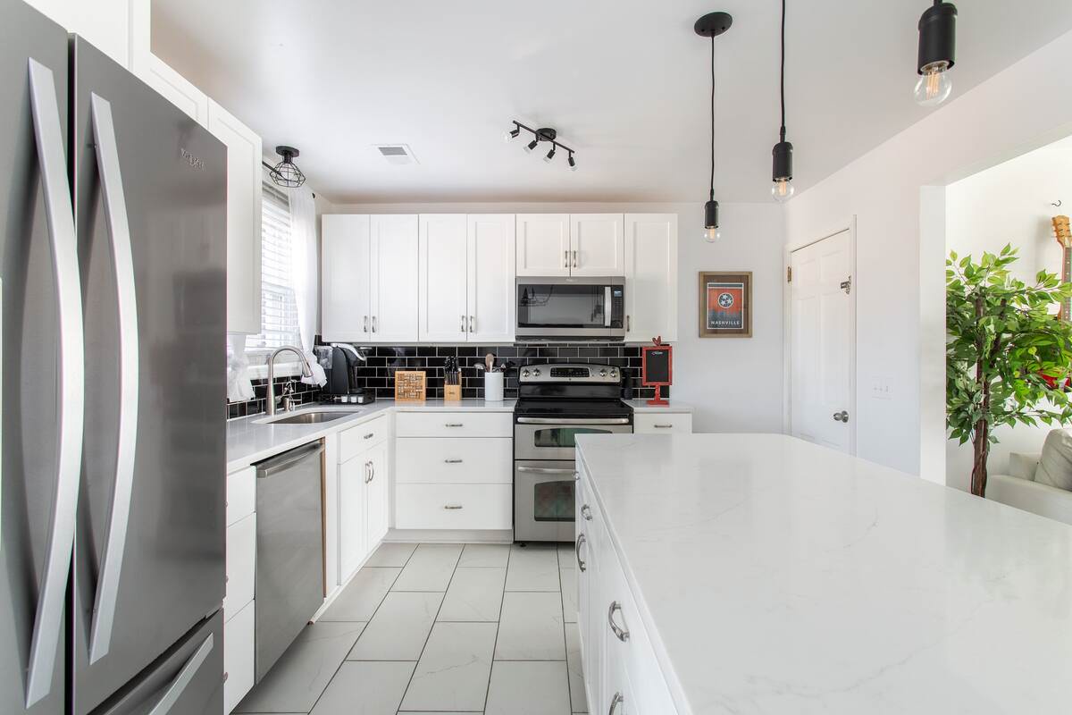 Kitchen with toaster, standard drip coffee maker, blender, and more