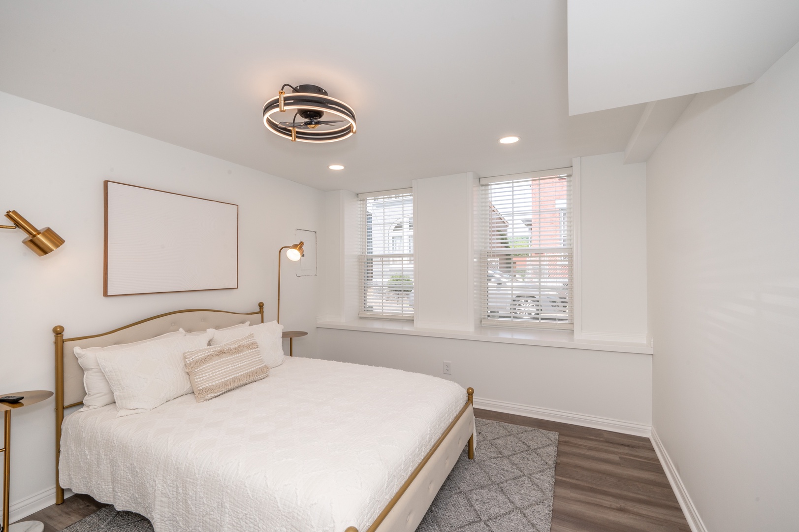 Unit 101: The tranquil queen bedroom offers a large closet & ceiling fan