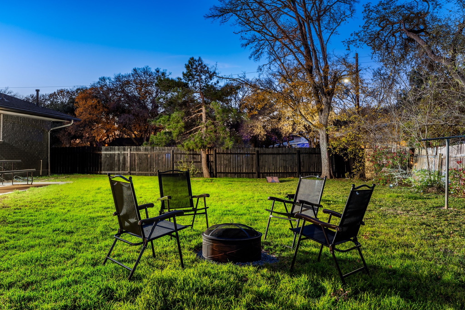 The large back yard offers ample space for relaxation & play