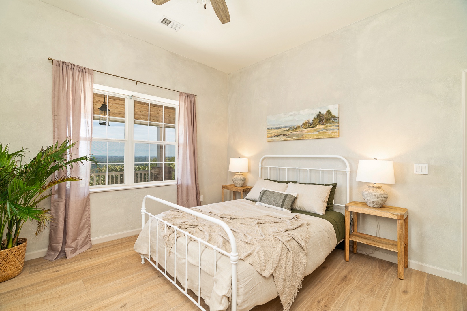 The second bedroom retreat boasts a plush king-sized bed