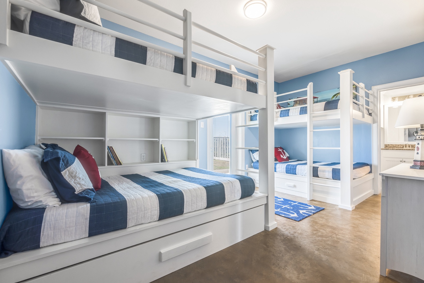 The 1st Floor Bunk Room offers 2 Full-Over-Full Bunks, Private En Suite, and Smart TV