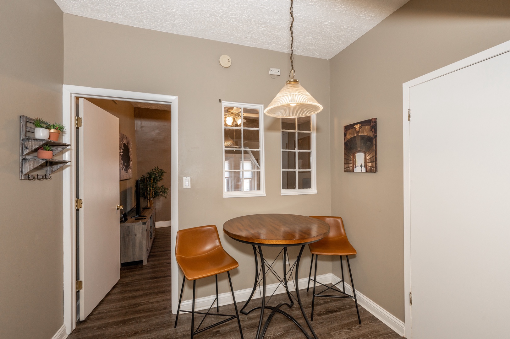 The stylish dining area in Monmouth Loft 3 offers cozy seating for 2