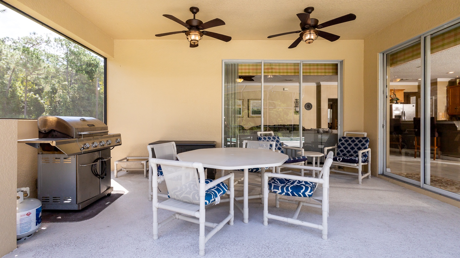 Dine al fresco on the back patio or relax while you grill up a feast!