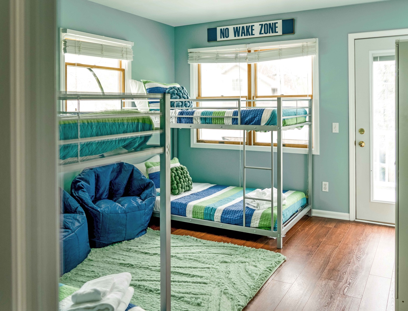 The final 2nd-floor bedroom offers a pair of twin-over-twin bunkbeds