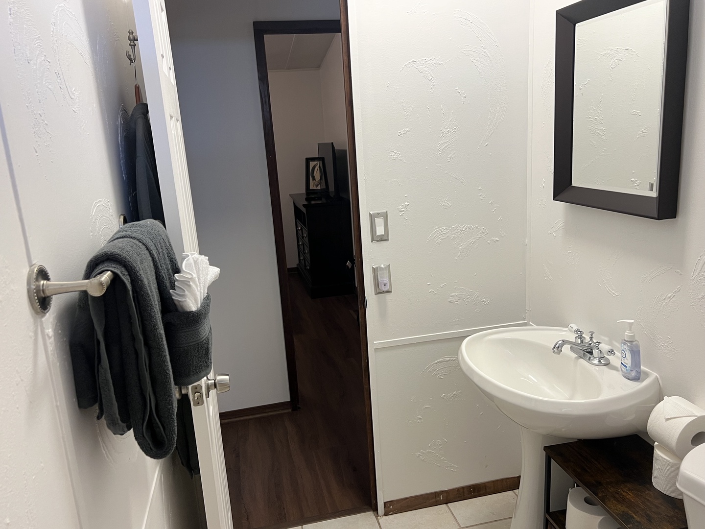 Shared bathroom with shower/tub combo