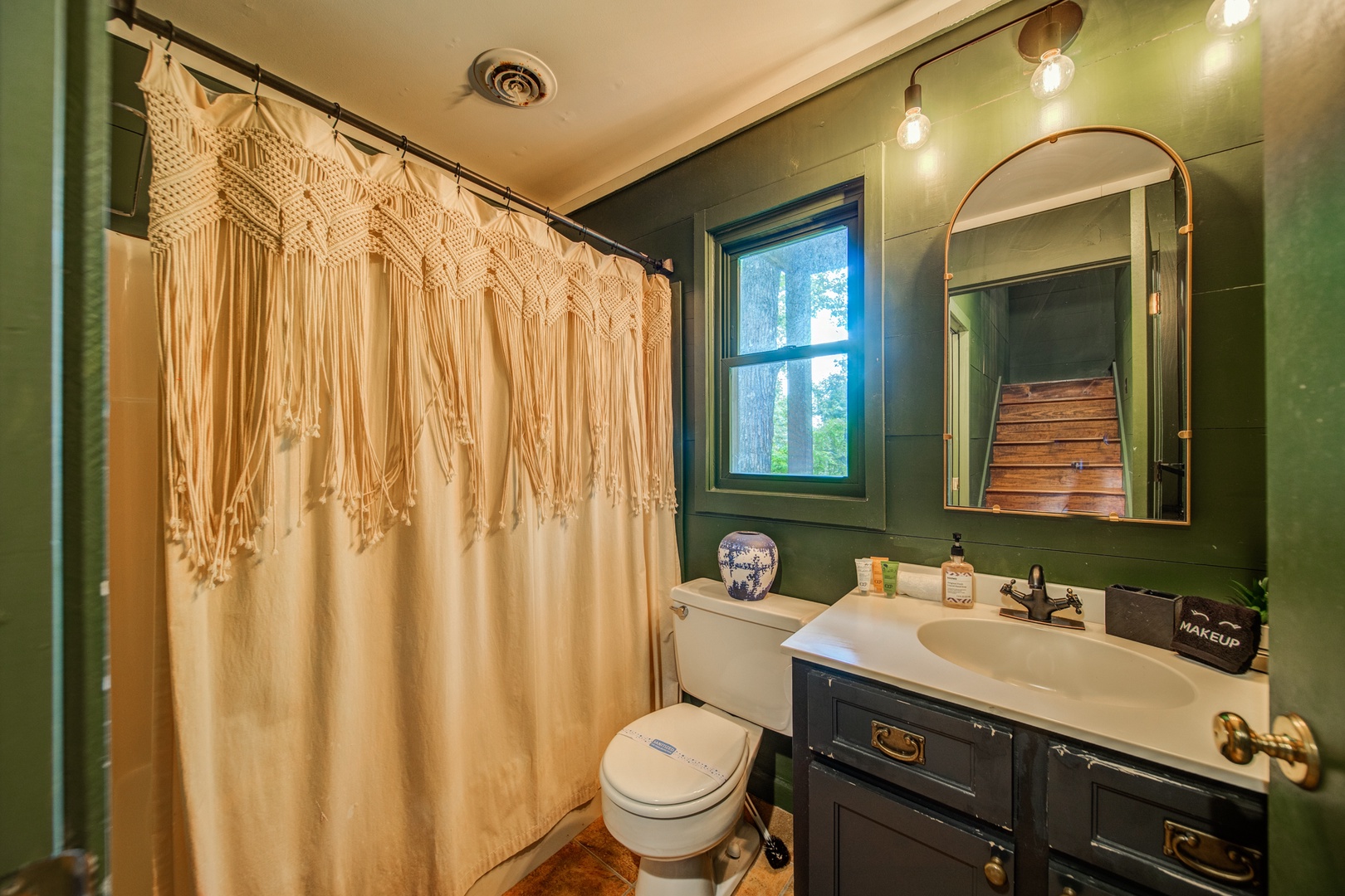 The lower level boasts an additional full bathroom with shower/tub combo