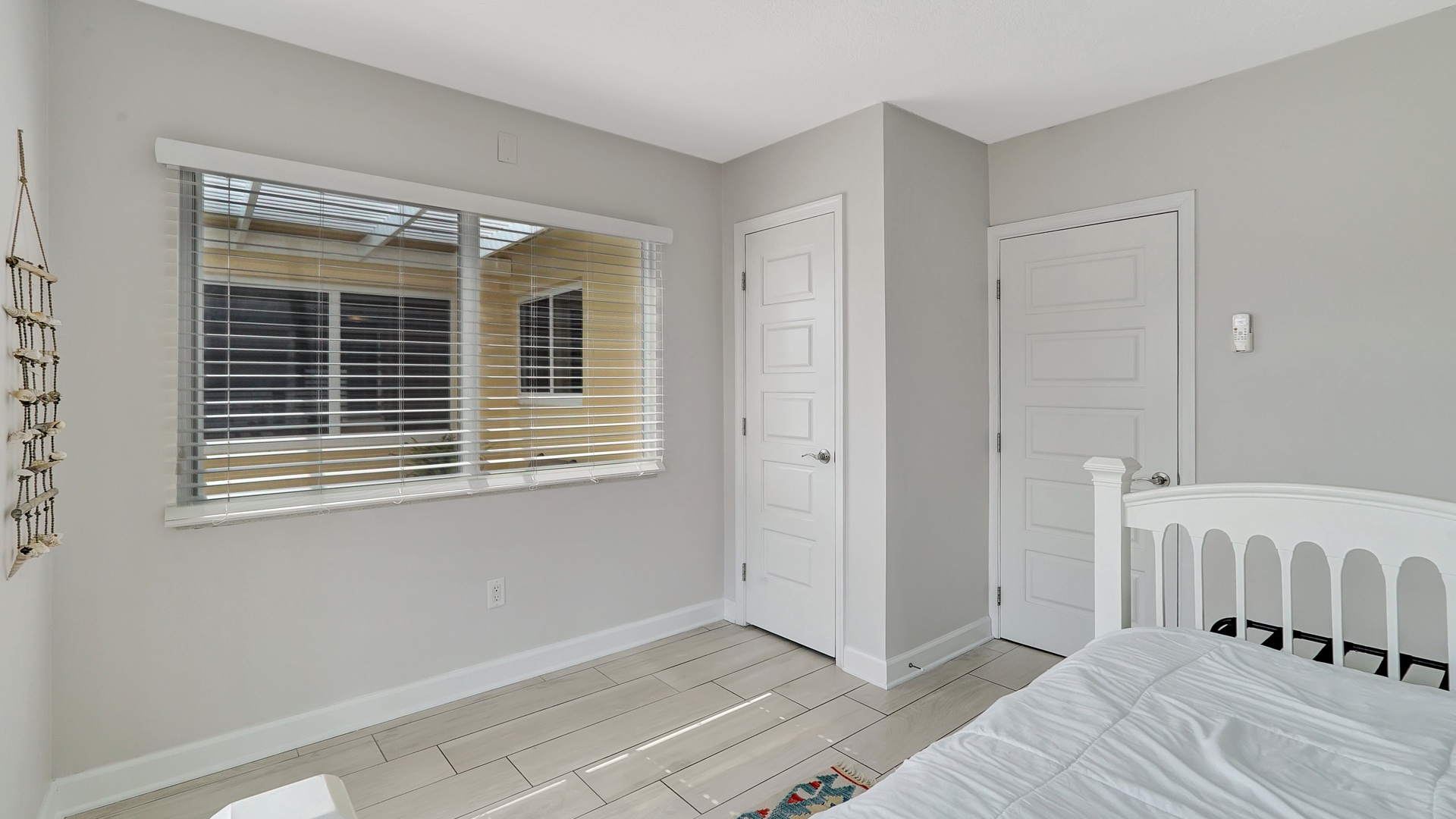 Bedroom 4 with full bed, trundle, and deck access