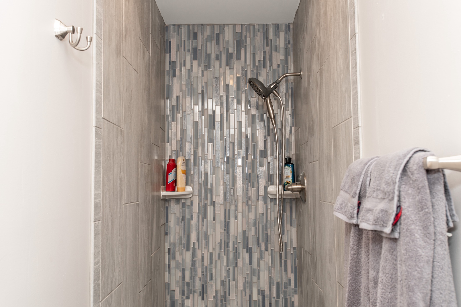 Apt 1 – The full bathroom includes a single vanity & walk-in shower