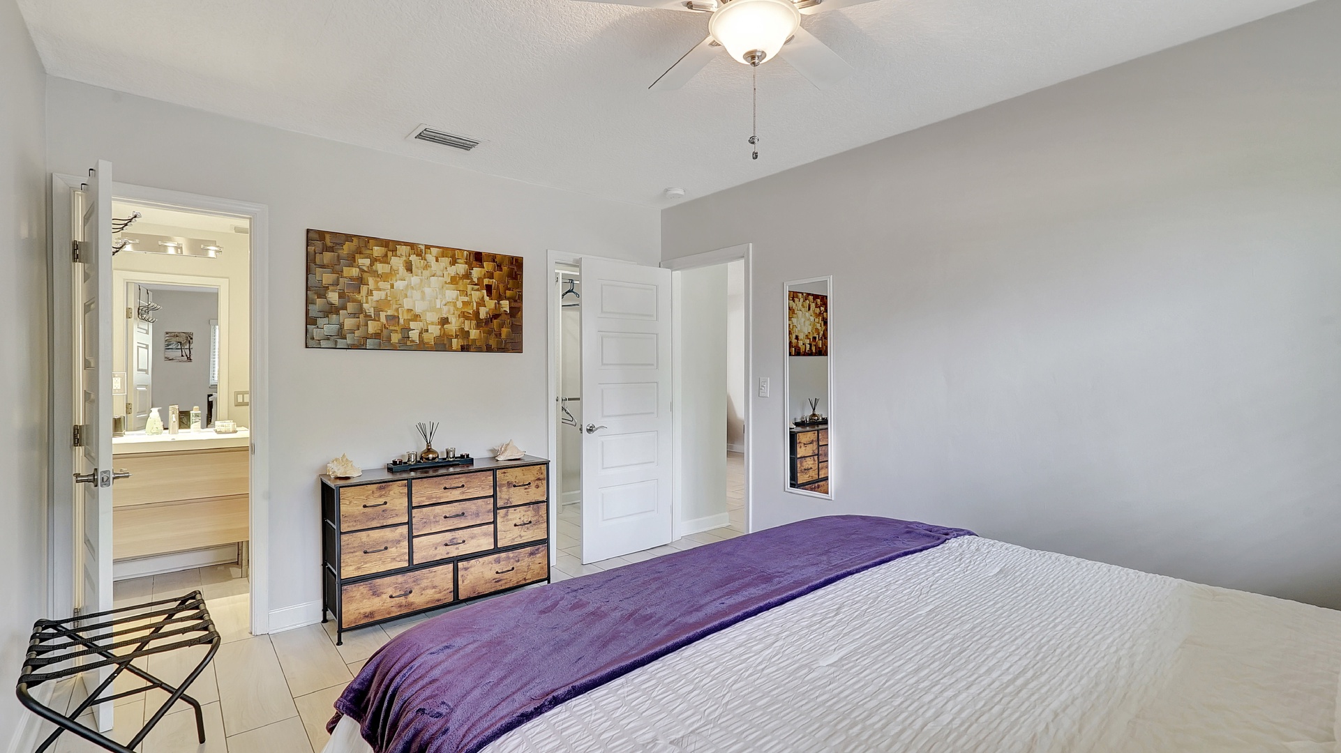 Bedroom 1 with king bed, Smart TV, and ensuite