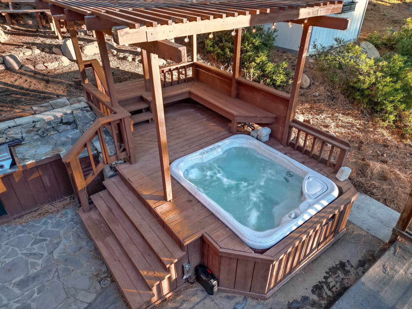 Take a soak in the private outdoor hot tub